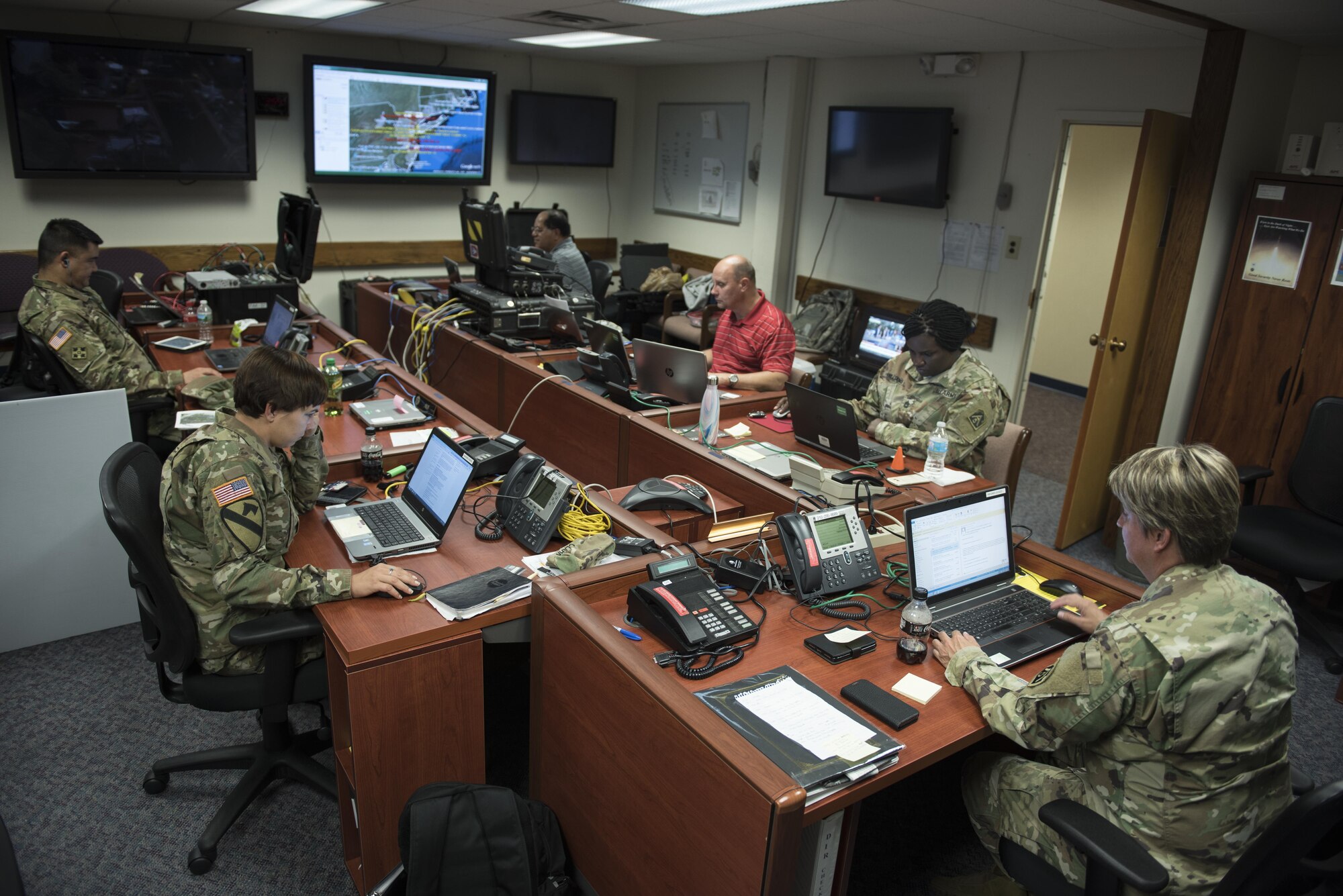 Members of Task Force 51, Army North’s Contingency Command Post, track personnel in and out of the theater and keep lines of communication open at their temporary headquarters at Joint Base McGuire-Dix-Lakehurst, N.J., Sept. 26, 2016. TF 51 supported the United Nations General Assembly in New York City, and prepared for any possible disaster scenario. 