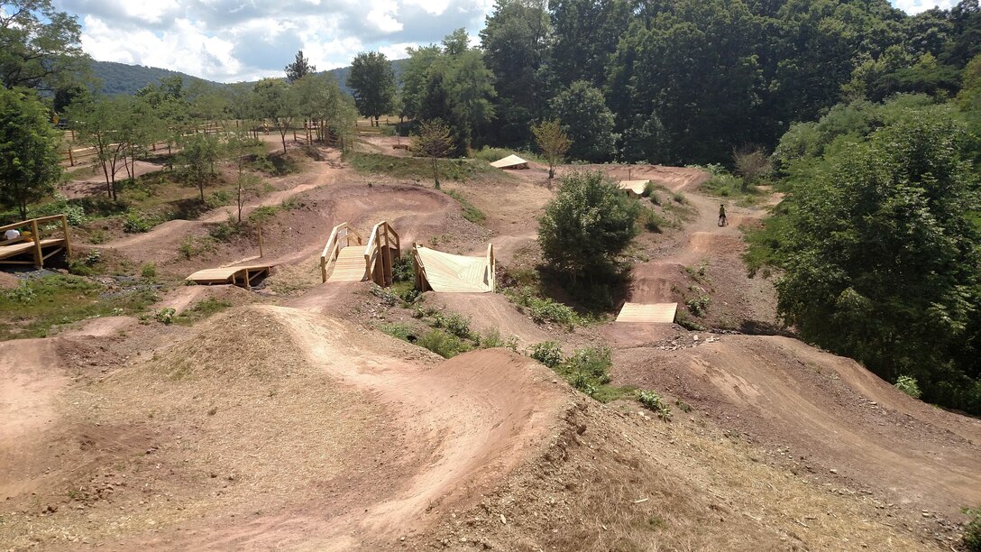 The Raystown Mountain Bike Skills Park, located on Raystown Lake Project in Hesston, Pa., park occupies approximately two acres and contains berms, natural and wooden features, small vertical drops, and other mountain bike skill features, giving riders a chance to experience and practice the skills necessary to safely navigate remote sections of the internationally-renowned Allegrippis Trail System.