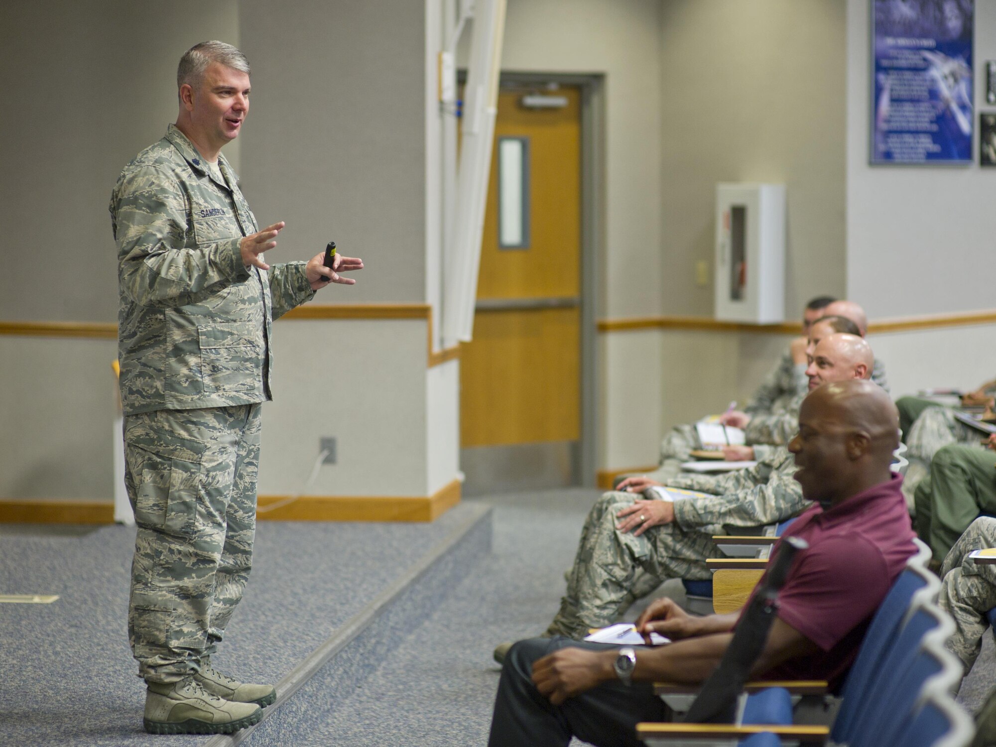 U.S. Air Force Lt. Col. George Sanderlin, Profession of Arms Center of Excellence course instructor, teaches Team Tyndall members leadership techniques at Tyndall Air Force Base, Fla., Sept. 28, 2016. The EHC course is centered on enhancing leadership through professionalism and personal interactions. (U.S. Air Force photo by Staff Sgt. Alex Fox Echols III/Released)