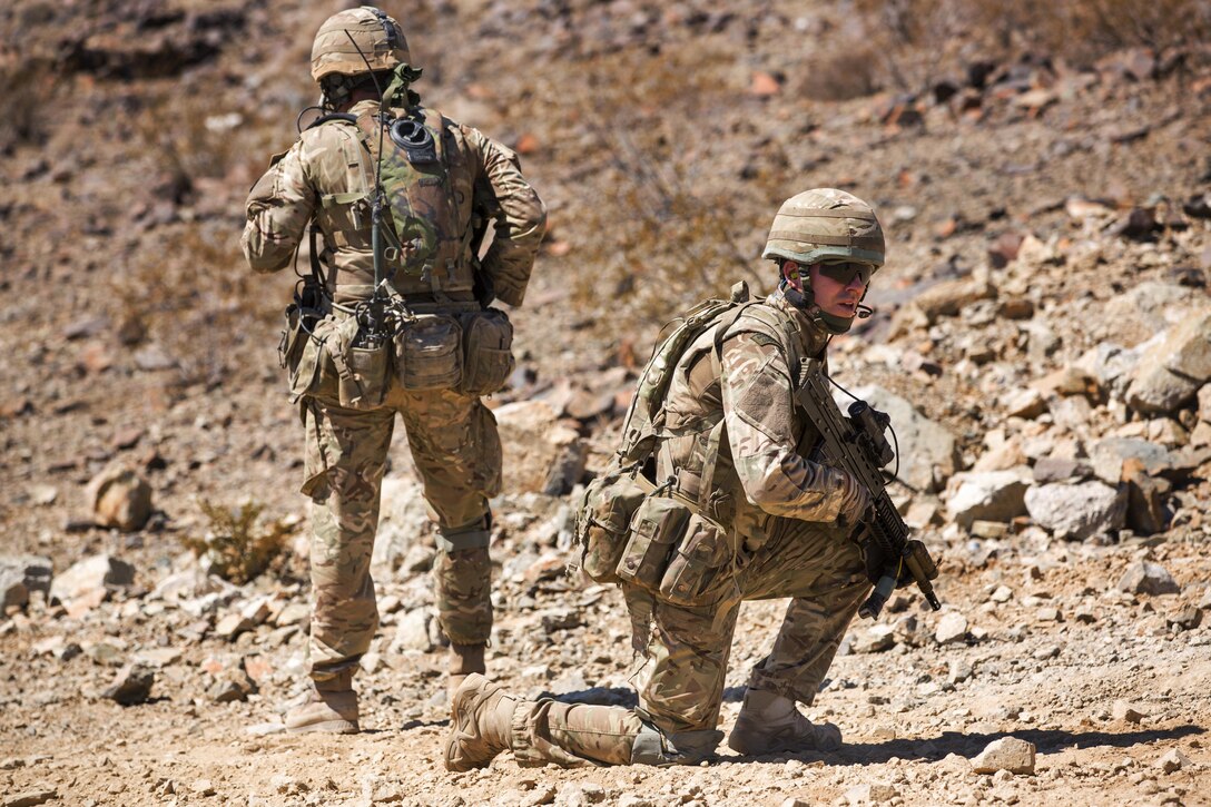 British Royal Marines conduct an assault on Range 205 as part of Exercise Black Alligator aboard the Marine Corps Air Ground Combat Center, Twentynine Palms, Calif., Sept. 13, 2016. U.S. and British Royal Marines conducted bilateral training in urban warfare maneuvers at Twentynine Palms, Calif. (U.S. Marine Corps photo by Cpl. Levi Schultz)