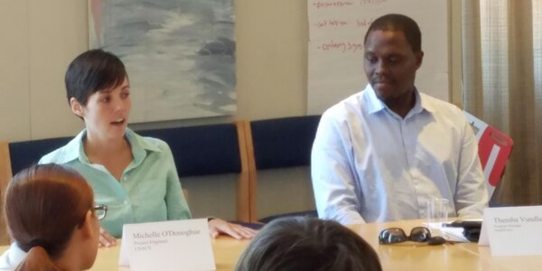 Michelle O'Donoghue talks with MassBay Community College students during a career panel in Wellesley, Massachusetts on Aug. 23.