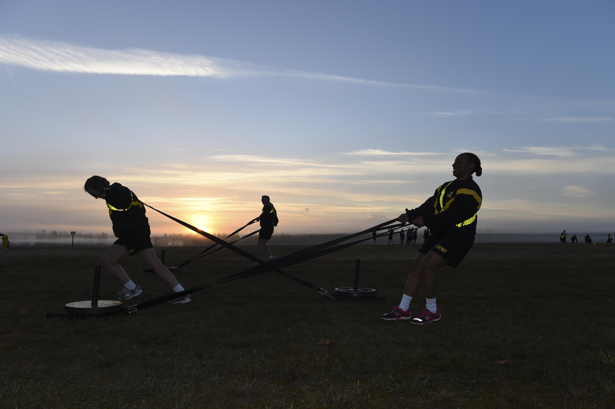 Army sergeant majors drag a 100-pound sled Sept. 29, 2016 at Heritage Hill on Joint Base Lewis-McChord, Wash. The top tier of JBLM enlisted members from the Army joined the Air Force chief master sergeants for an intense joint physical training session. (U.S. Air Force photo/Staff Sgt. Naomi Shipley)