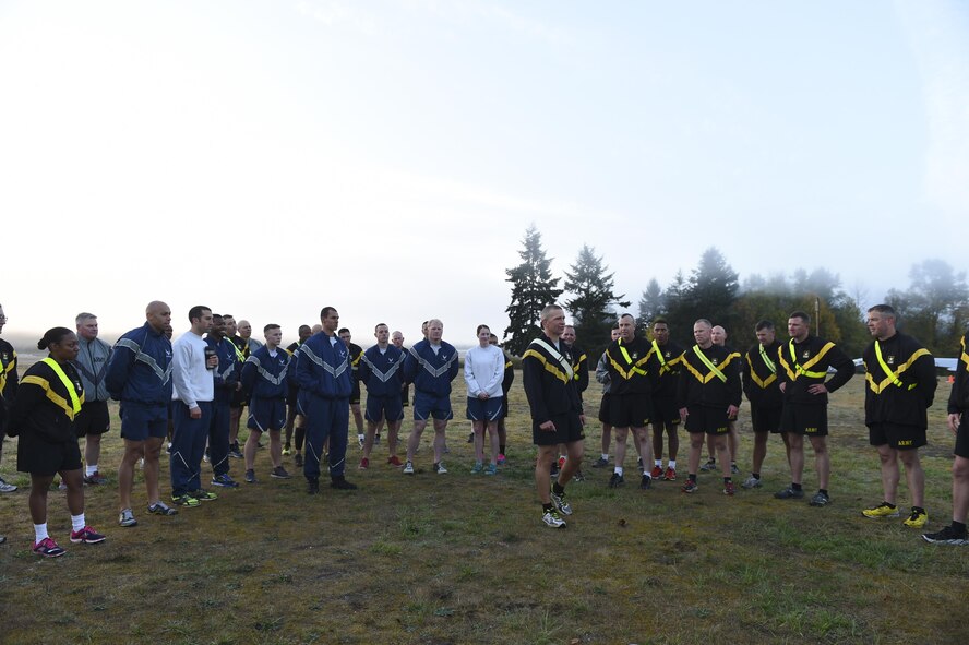 Command Sgt. Major Michael Anthony Grinston, 1st Corps Headquarters, speaks to the top tier of enlisted JBLM Air Force and Army service members who got together Sept. 29, 2016 at Heritage Hill on Joint Base Lewis-McChord, Wash. The group met for an early-morning physical training session and cross service mentorship and leadership training later in the day. (U.S. Air Force photo/Staff Sgt. Naomi Shipley)