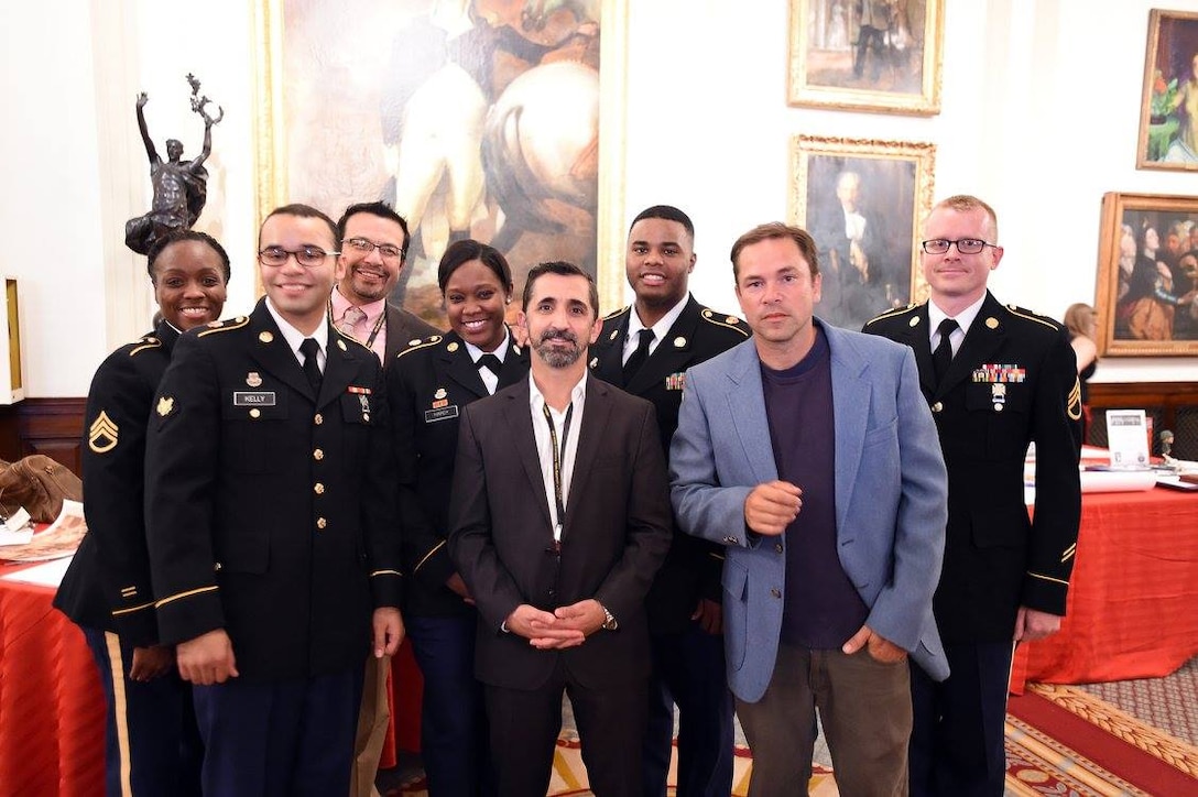 Army Reserve soldiers assigned to the 85th Support Command, headquartered near Chicago, pause for a photo with actors from HBO's Band of Brothers mini-series, Peter Youngblood, James Madio, and Rene Mareno, September 24, 2016. The soldiers were in attendance to present the colors for the 70th anniversary reunion of Easy Company, 2nd Battalion, 506th Parachute Infantry Regiment, 101st Airborne Division, hosted in Chicago. Veterans Al Mampre and Brad Freeman, who were the only two at the ceremony were assigned to Easy Company during World War II.
(Photo by Sgt. Aaron Berogan)