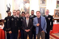 Army Reserve soldiers assigned to the 85th Support Command, headquartered near Chicago, pause for a photo with actors from HBO's Band of Brothers mini-series, Peter Youngblood, James Madio, and Rene Mareno, September 24, 2016. The soldiers were in attendance to present the colors for the 70th anniversary reunion of Easy Company, 2nd Battalion, 506th Parachute Infantry Regiment, 101st Airborne Division, hosted in Chicago. Veterans Al Mampre and Brad Freeman, who were the only two at the ceremony were assigned to Easy Company during World War II.
(Photo by Sgt. Aaron Berogan)