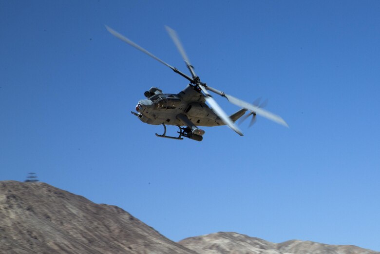 An AH-1Z Super Cobra with Marine Light Attack Helicopter Squadron flies over Range 220, the Combat Center’s largest military operations on urbanized terrain facility, Sept. 23, 2016, as part of Exercise Talon Reach. Officers awaiting training at Marine Corps Communication-Electronics School and Marine Corps Intelligence School also participated in the exercise, for the first time, to create a mutually beneficial learning environment. (Official Marine Corps photo by Lance Cpl. Eric Clayton/Released)