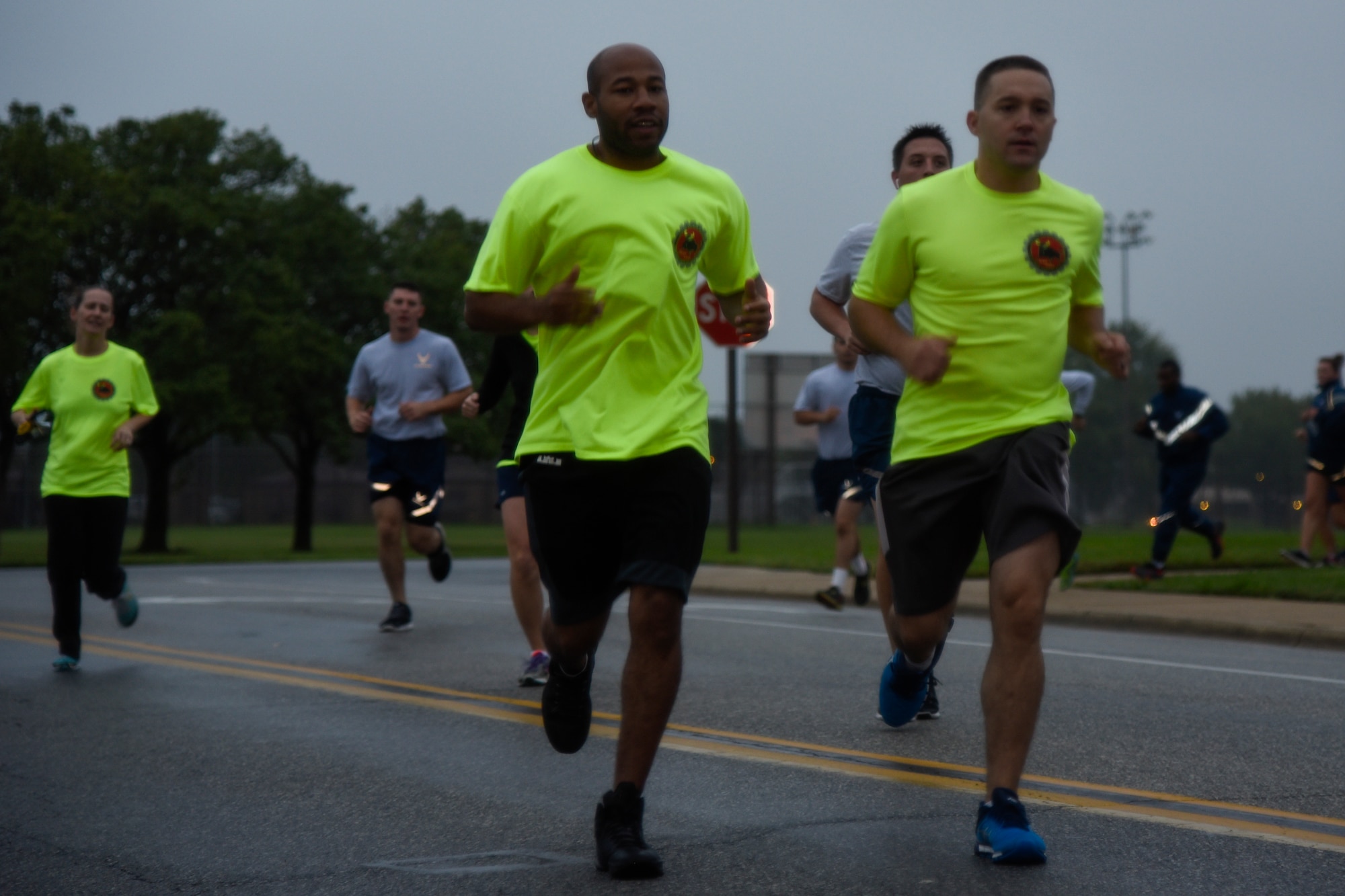 The 11th Security Forces Group and 11th Civil Engineering Squadron race to the finish line in the National Preparedness Month 5K on Joint Base Andrews, Md., Sept. 30, 2016. NPM is a time to inform installation members on techniques to use during a disaster. More than 50 runners participated in the 5K. (U.S. Air Force photo by Airman 1st Class Valentina Lopez)