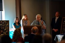 Ann Lukens, 23d Force Support Squadron school liaison officer, speaks during her retirement ceremony, Sept. 30, 2016, at Moody Air Force Base, Ga. Under Lukens’ leadership, Moody’s Airman & Family Readiness Center implemented several core programs such as Personal Financial Management, Relocation and Transition Assistance, the Air Force Aid Society, Personal and Family Readiness, and the Military Child Education program. (U.S. Air Force photo by Airman 1st Class Greg Nash)