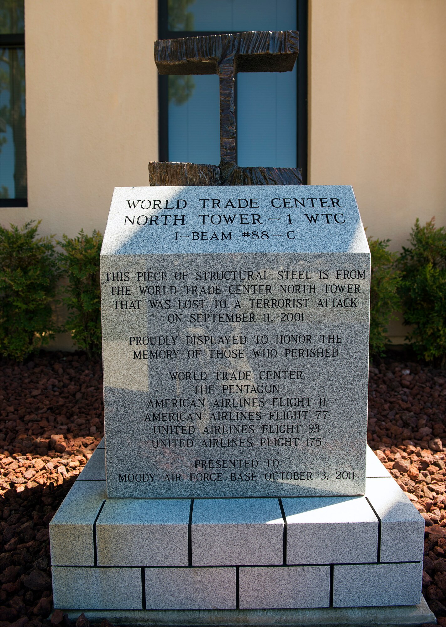 A piece of steel from the Twin Towers sits on display in front of Moody’s fire department, Sept. 30, 2016, at Moody Air Force Base, Ga. 
Ann Lukens, 23d Force Support Squadron school liaison officer, said one of her proudest moments was helping to get this artifact delivered to Moody on Oct. 4, 2011, for permanent display.  (U.S. Air Force photo by Airman 1st Class Greg Nash)
