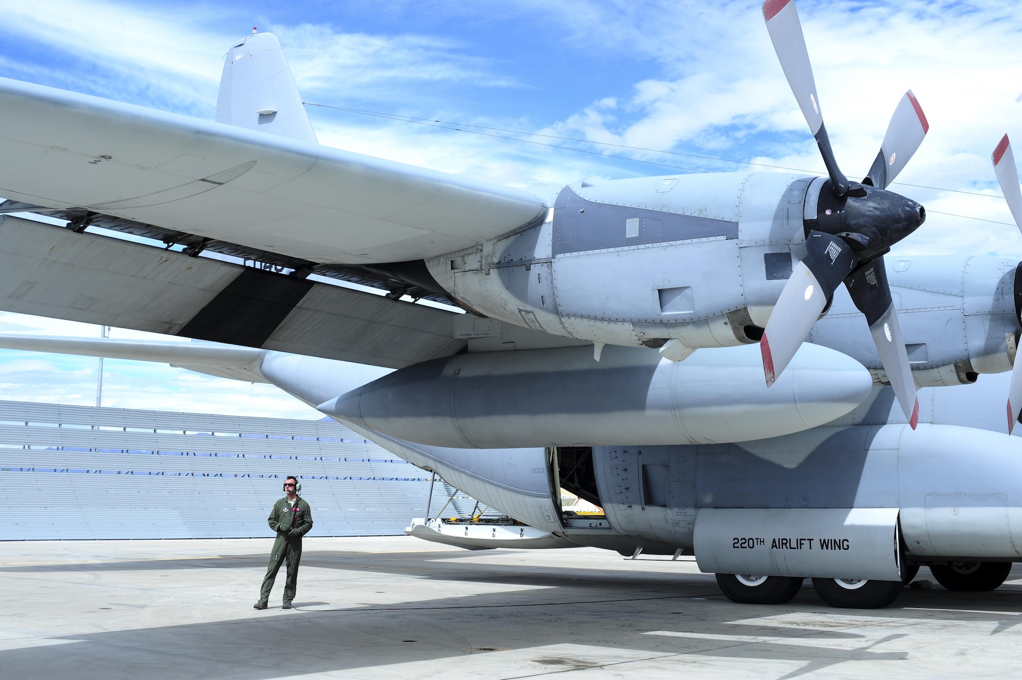 A U.S. Airman from the 514th Flight Test Squadron out of Hill Air Force Base, Utah, performs pre-flight checks on a C-130T before executing a functional-check flight at Davis-Monthan AFB, Ariz., Sept. 28, 2016. The 576th Aerospace Maintenance and Regeneration Squadron converted a KC-130T for use by the Philippine Air Force by removing classified communications equipment. (U.S. Air Force photo by Airman Nathan H. Barbour)