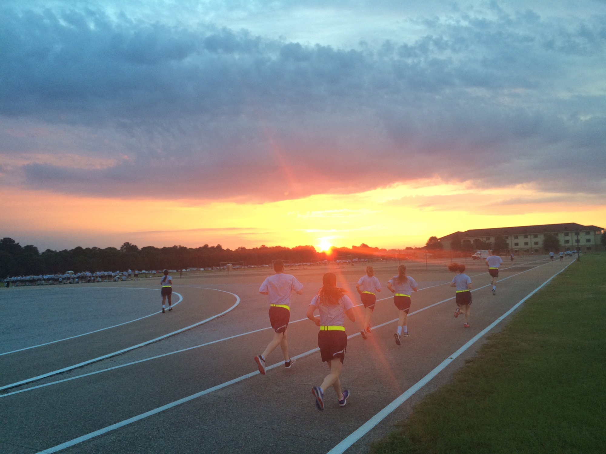 Students complete a pre-dawn physical fitness test to start their day.
