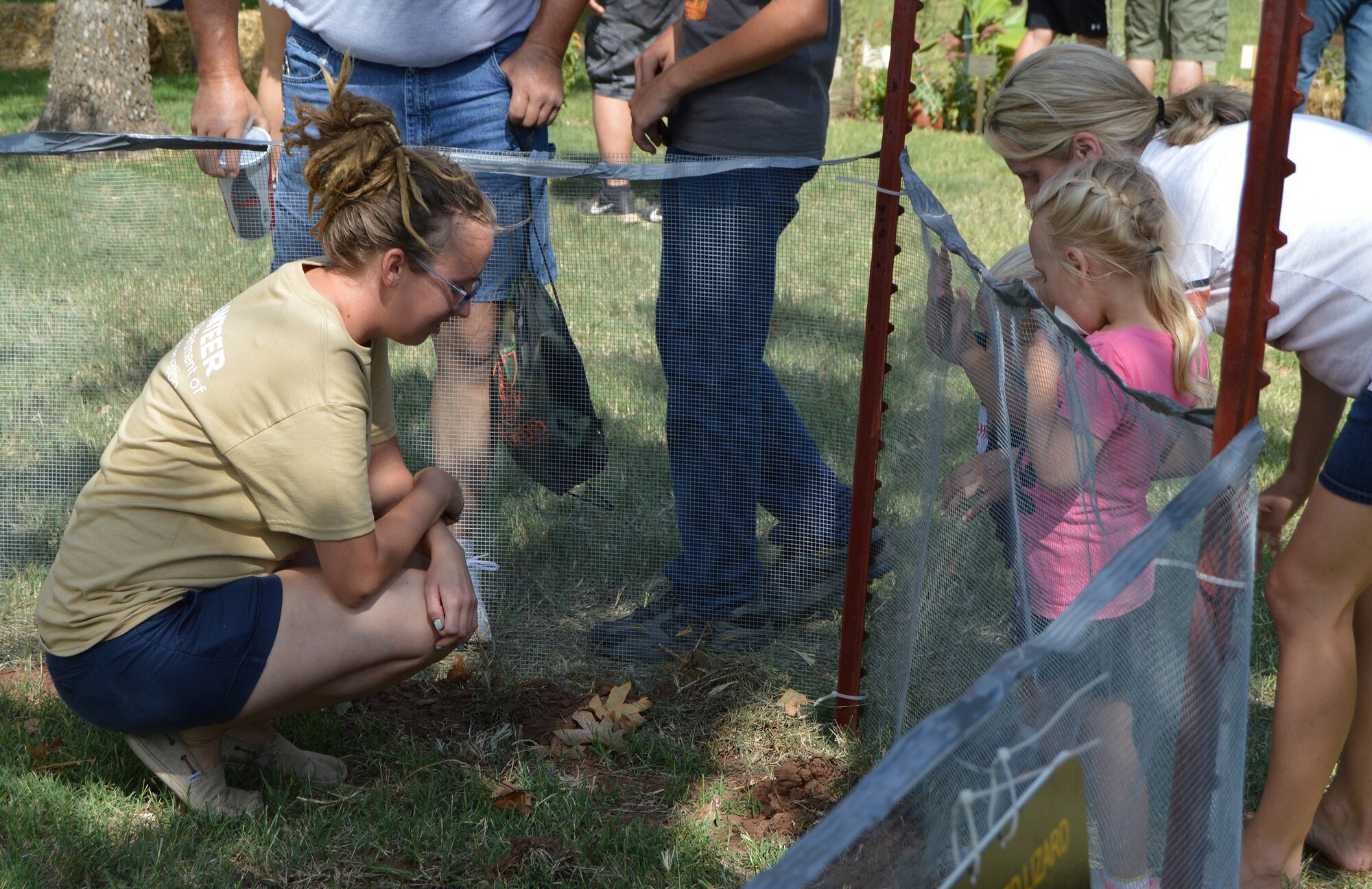Miranda Vesy, a Southern Illinois University employee who works on lizard research at Tinker Air Force Base, talks about the Texas horned lizard with attendees at the Sept. 24 Wildlife Expo at the Lazy E in Guthrie. Ms. Vesy works in conjunction with the 72nd Air Base Wing Civil Engineering Squadron’s Natural Resources office. (Air Force photo by April McDonald)