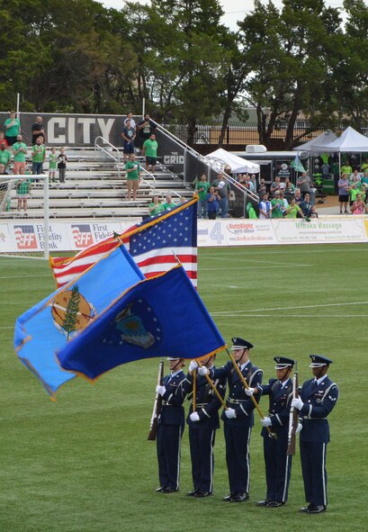 Members of the Tinker Honor Guard present the colors during the Oklahoma City Energy’s Military Appreciation Night. (Air Force photo by April McDonald)