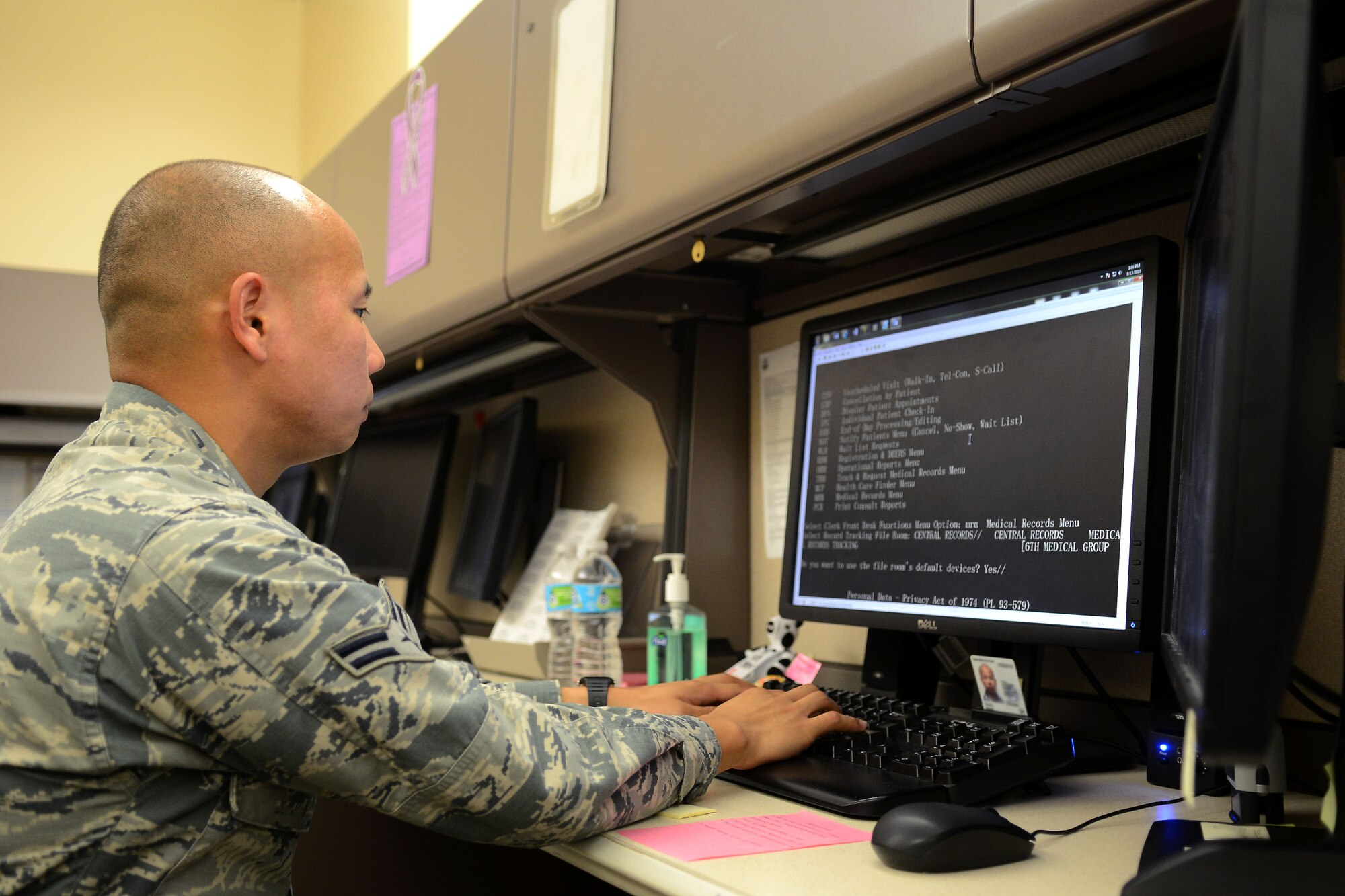 Airman 1st Class Seng Thao, a medical records technician assigned to the 6th Medical Support Squadron, works on his computer Sept. 15, 2016, at MacDill Air Force Base Fla. Thao plays a unique role by making sure every service member has accurate health records. (U.S. Air Force photo by Airman 1st Class Rito Smith) 