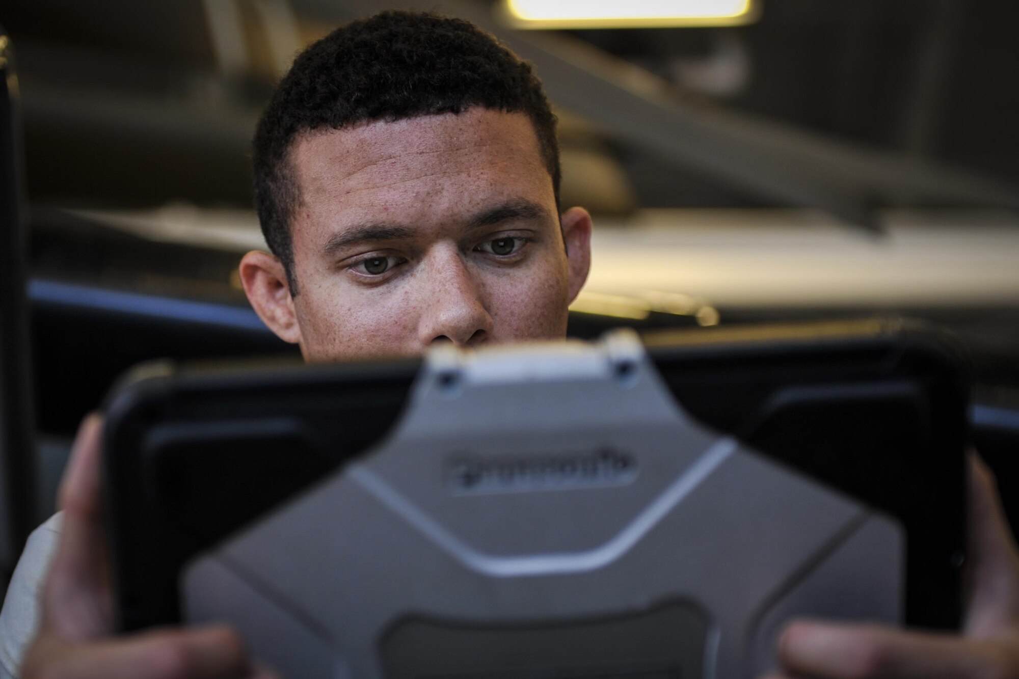 Staff Sgt. Marcus Clement, a crew chief with the 801st Special Operations Aircraft Maintenance Squadron, reviews a task guide at Hurlburt Field, Fla., Sept. 29, 2016. Crew chiefs with the 801st SOAMXS are trained to diagnose malfunctions on the Osprey during pre and post-flight inspections, repair and refuel the aircraft, keep detailed records and ensure the aircraft are mission ready at all times. (U.S. Air Force photo by Airman 1st Class Joseph Pick)
