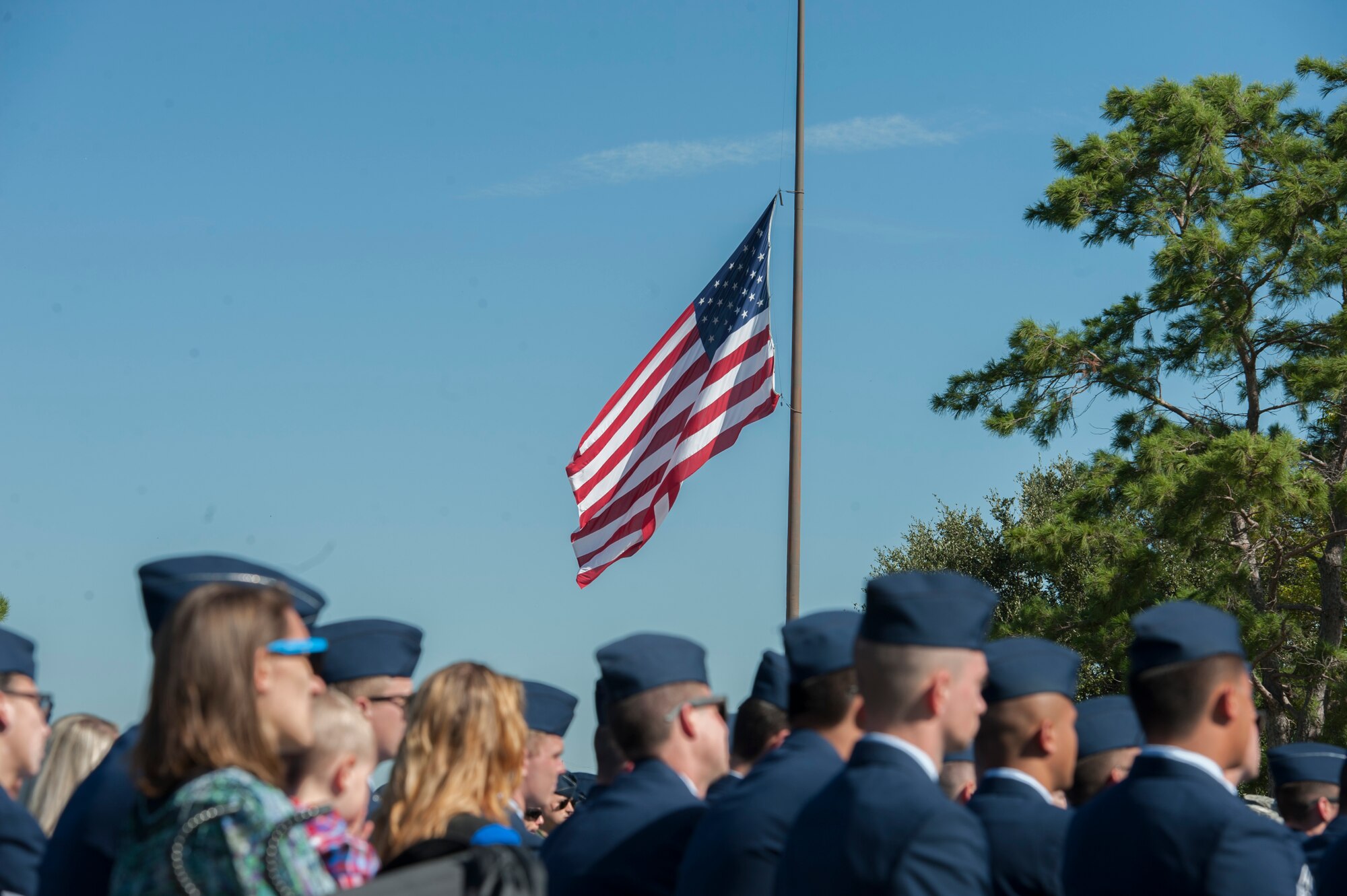 The American flag waves during the TORQE 62 memorial ceremony at Dyess Air Force Base, Sept. 30, 2016. Airmen, family, friends and members of the Abilene community were present to honor the fallen Airmen of TORQE 62. (U.S. Air Force photo by Airman 1st Class Rebecca Van Syoc)