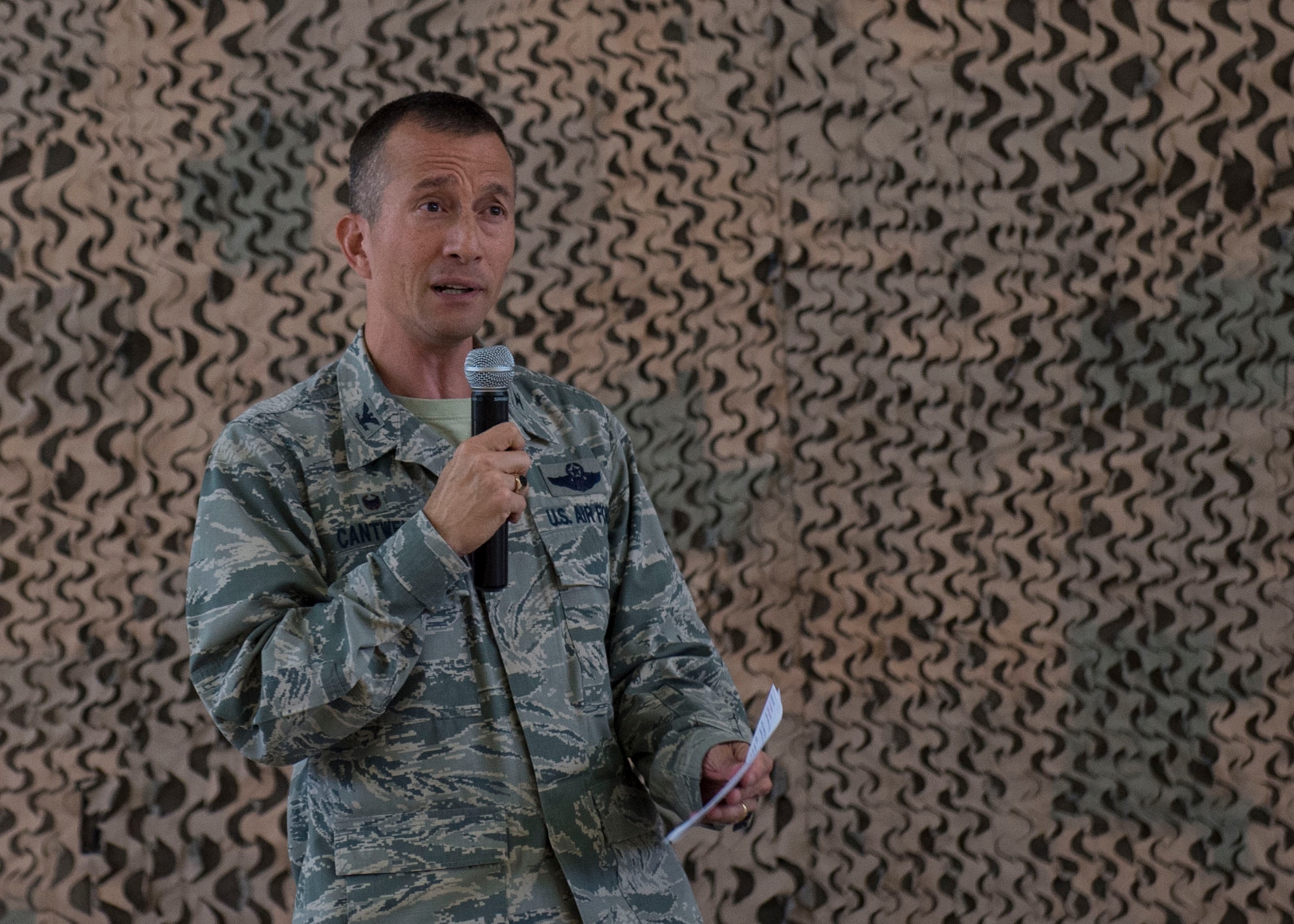 Colonel Houston Cantwell, the 49th Wing commander, addresses Holloman Airmen during his first commander’s call at Holloman Air Force Base, N.M., on Sept. 29. Cantwell discussed various topics with the Airmen from his first impressions to the importance of the RPA mission here. (U.S. Air Force photo by Senior Airman Aaron Montoya)