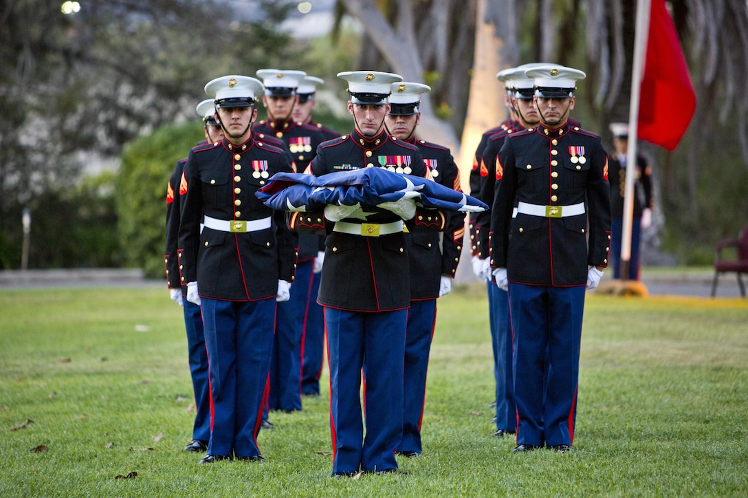 U. S. Marines with Marine Corps Installations West, Marine Corps Base Camp Pendleton, retire the colors during the commanding general’s evening colors ceremony at the historic Santa Margarita Ranch House on Camp Pendleton, Calif., Sept. 28, 2016. (U.S. Marine Corps photo by Sgt. Tabitha A. Markovich)