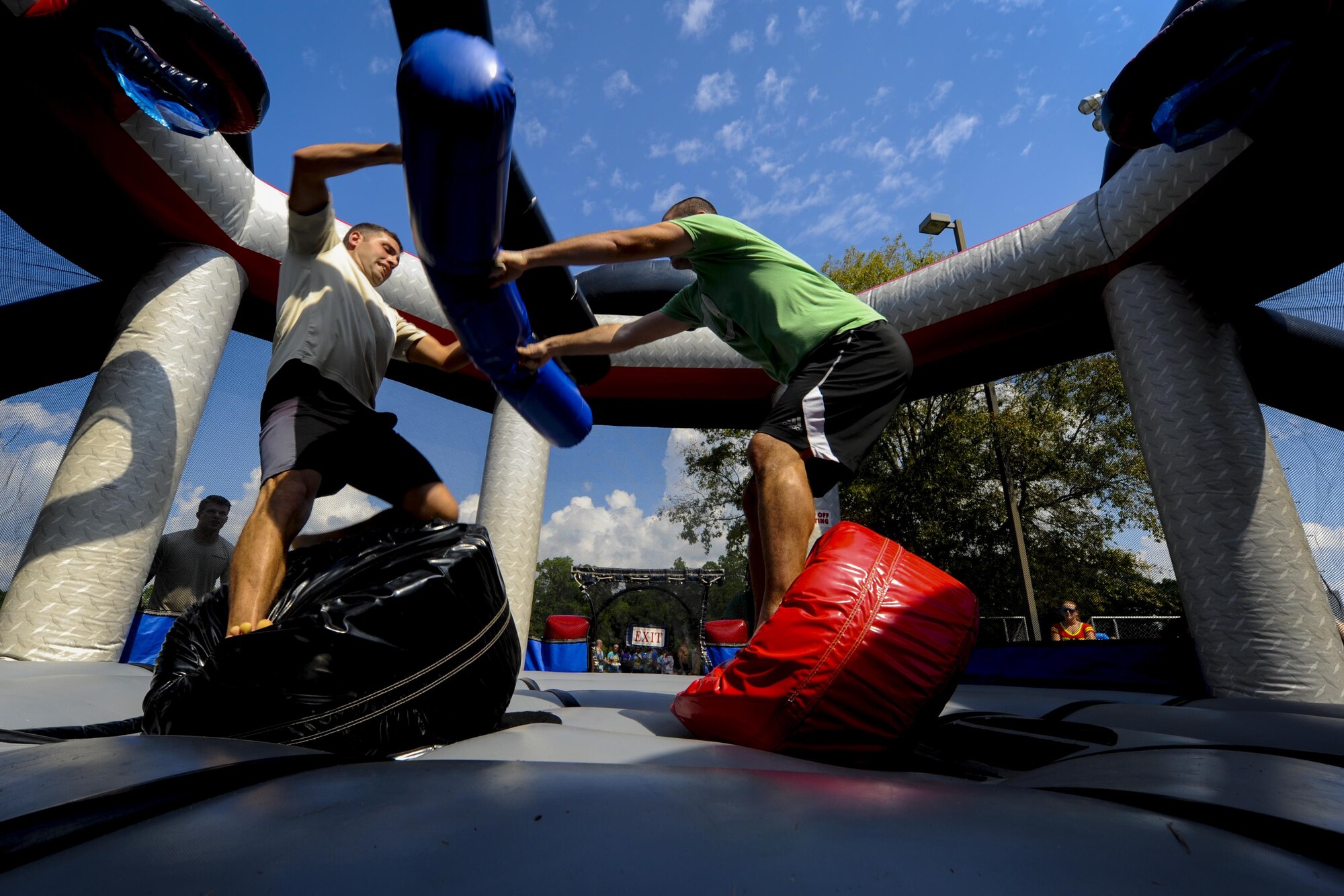 Air Commandos compete in a pugil stick competition during the Green Dot Olympics at Hurlburt Field, Fla., Sept. 28, 2016. Pugil stick sparring was one of several challenges in the event. Additional challenges included an ultimate obstacle course, combat hurdles and a sandbag carry.  (U.S. Air Force photo by Airman Dennis Spain)