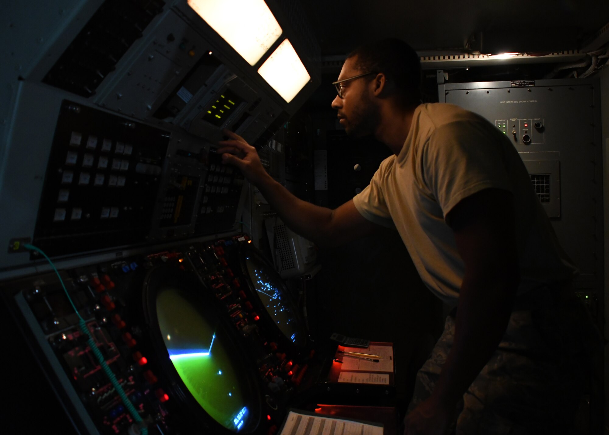 U.S. Air Force Senior Airman Darrin Brewer, a ground radar systems technician with the 727th Expeditionary Air Control Squadron Detachment 3, ensures that a radar system is functioning correctly at Al Udeid Air Base, Qatar, March 31, 2017. The 727th EACS Det. 3 works to maintain two ground radar systems at Al Udeid, and ensures that at least one of them is running at all times. (U.S. Air Force photo by Senior Airman Miles Wilson)