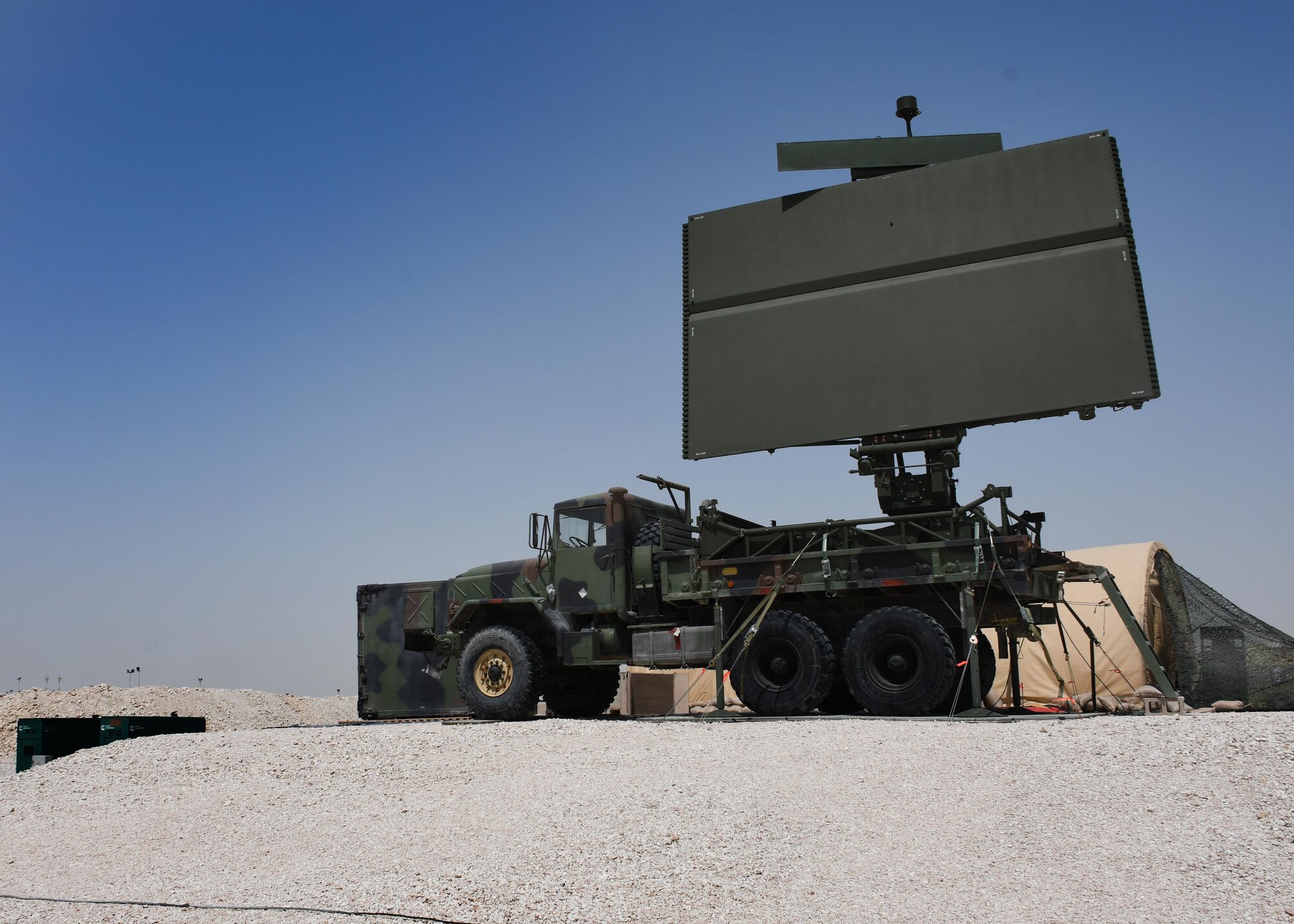 A mobile TPS-75 ground radar system sits on a truck at Al Udeid Air Base, Qatar, March 31, 2017. The ground radar system is maintained by the 727th Expeditionary Air Control Squadron Detachment 3, and monitors the airspace around Al Udeid. (U.S. Air Force photo by Senior Airman Miles Wilson)