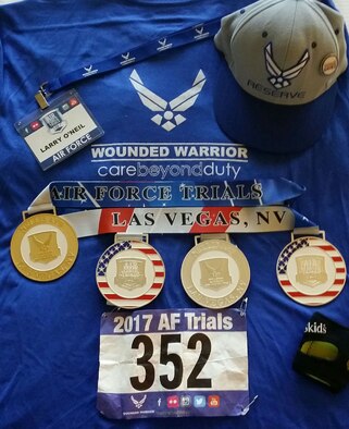 Tech. Sgt. Larry O'Neil showcases the medals he won during the 2017 Warrior Games trials in Las Vegas. (courtesy photo)