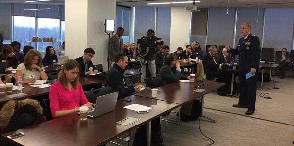 U.S. Air Force Gen. John E. Hyten (Standing, right), commander of U.S. Strategic Command (USSTRATCOM), addresses members of the Military Reporters and Editors Association on the need for nuclear modernization during their annual meeting in Rosslyn, Va., March 31, 2017.