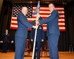 (Left to right) Col. Heath Fowler, 931st Maintenance Group commander, hands the 931st Maintenance Squadron guidon to Maj. Justin Franklin during an Assumption of Command Ceremony April 1, 2017, McConnell Air Force Base, Kan.  The transfer of the unit guidon symbolizes the transfer of authority from the previous commander to the new commander.  Franklin was previously the commander of the 513th Maintenance Squadron, 513th Air Control Wing, Tinker Air Force Base, Okla.  (U.S. Air Force photo by Tech. Sgt. Abigail Klein)