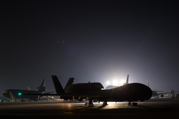 Members of the 380th Expeditionary Maintenance Squadron complete pre-flight checks on an EQ-4 Global Hawk equipped with a battlefield airborne communications node at an undisclosed location in Southwest Asia, March 31, 2017. This launch marked 1000 consecutive sorties without a maintenance cancel while supporting Combined Joint Task Force-Operation Inherent Resolve. These remotely piloted aircraft have provided a critical communication bridge between multi-national Coalition assets working to defeat ISIS in the area of responsibility. (U.S. Air Force/Senior Airman Tyler Woodward)