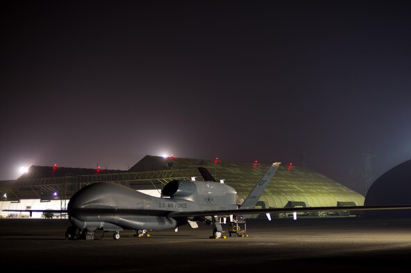 Members of the 380th Expeditionary Maintenance Squadron complete pre-flight checks on an EQ-4 Global Hawk equipped with a battlefield airborne communications node at an undisclosed location in Southwest Asia, March 31, 2017. This launch marked 1000 consecutive sorties without a maintenance cancel while supporting Combined Joint Task Force-Operation Inherent Resolve. These remotely piloted aircraft have provided a critical communication bridge between multi-national Coalition assets working to defeat ISIS in the area of responsibility. (U.S. Air Force/Senior Airman Tyler Woodward)