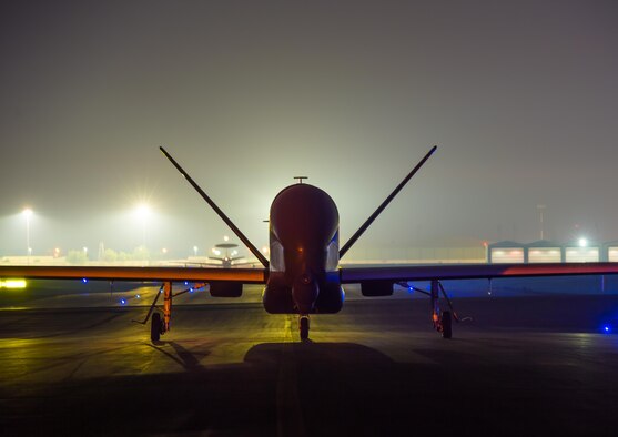 A 380th Air Expeditionary Wing EQ-4 Global Hawk, equipped with a battlefield airborne communications node, taxis before launching a sortie in support of Combined Joint Task Force-Operation Inherent Resolve at an undisclosed location in Southwest Asia, March 31, 2017. BACN has been used to bridge communication multi-national Coalition ground and air assets working to defeat ISIS. (U.S. Air Force/Senior Airman Tyler Woodward)