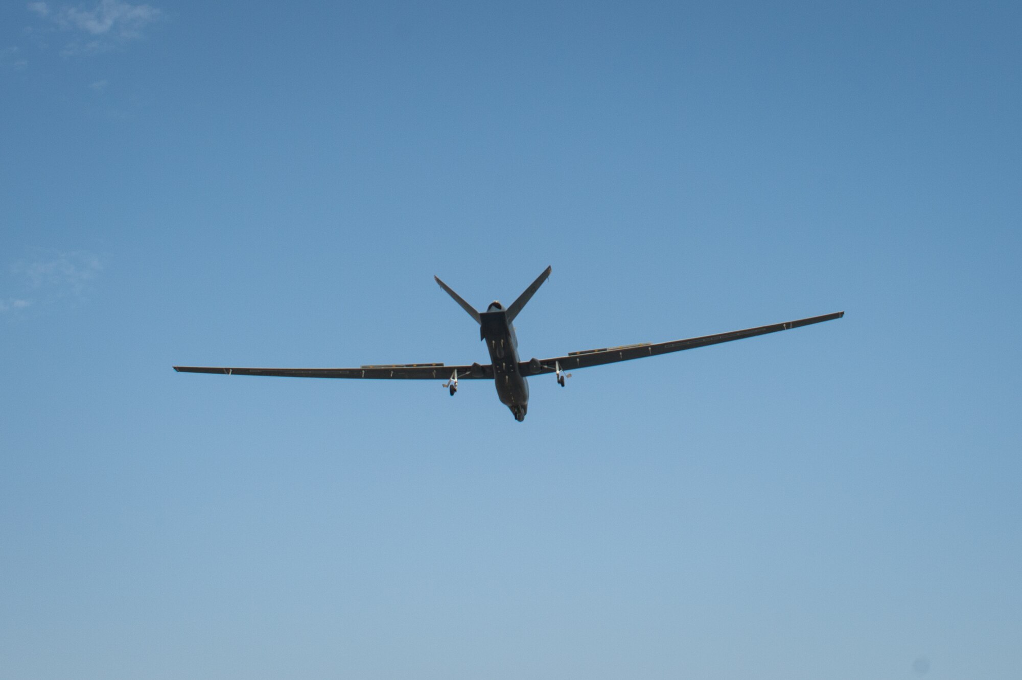 A 380th Air Expeditionary Wing EQ-4 Global Hawk, equipped with a battlefield airborne communications node, prepares to land after completing a sortie in support of Combined Joint Task Force-Operation Inherent Resolve at an undisclosed location in Southwest Asia, April 1, 2017. The successful completion of this sortie marked 1000 in a row for the BACN Global Hawks. (U.S. Air Force/Senior Airman Tyler Woodward)