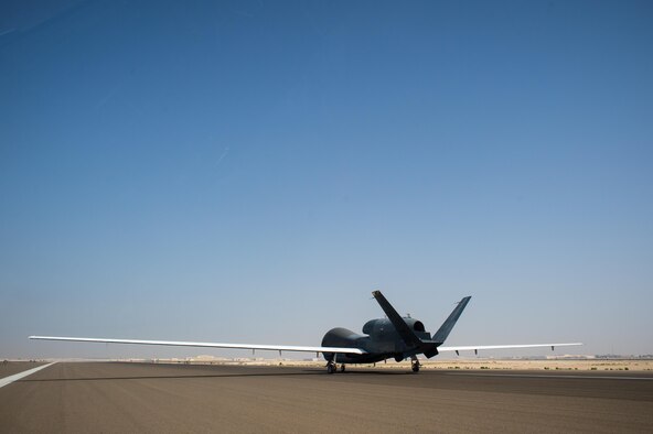 A 380th Air Expeditionary Wing EQ-4 Global Hawk, equipped with a battlefield airborne communications node, prepares to land after completing a sortie in support of Combined Joint Task Force-Operation Inherent Resolve at an undisclosed location in Southwest Asia, April 1, 2017. The successful completion of this sortie marked 1000 in a row for the BACN Global Hawks. (U.S. Air Force/Senior Airman Tyler Woodward)