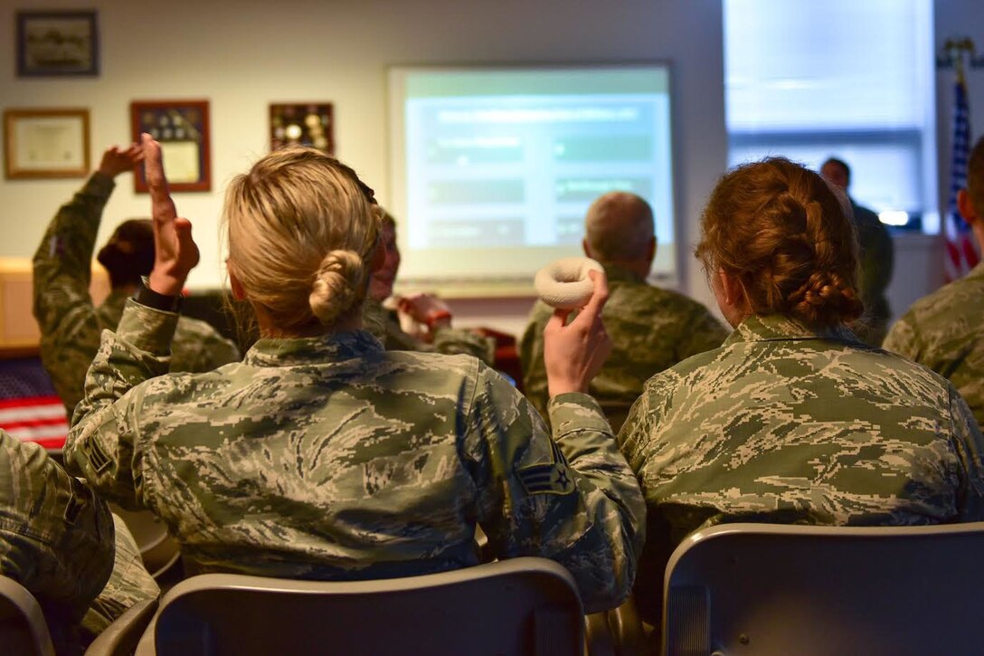 Members of the 914th Aeromedical Staging Squadron participate in Wingman Day activities Sunday, April 2, 2017 at the Niagara Falls Air Reserve Station, N.Y. The  curriculum consisted of small group, "healthy connections," activities as well as resilience-focused discussions. (U.S. Air Force photo by Staff Sgt. Richard Mekkri)