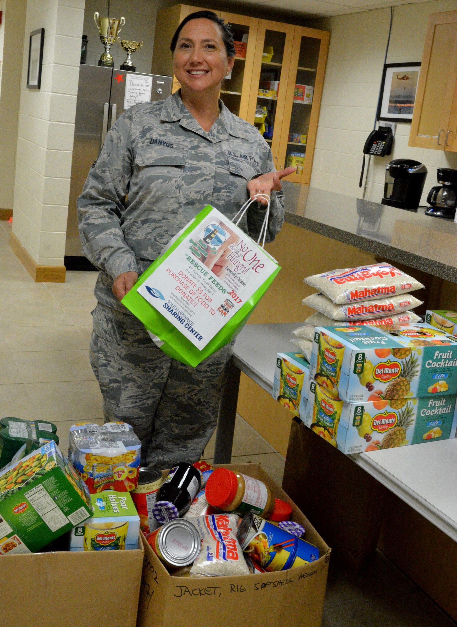 Master Sgt. Rhonda Danyus, 308th Rescue Squadron unit training manager, encourages Airmen to donate nonperishable food and toiletries to the 4th Annual Rescue Feeds Food Drive. Those interested may drop off items in bins located throughout the wing now through April 7, 2017. (U.S. Air Force photo/Senior Airman Brandon Kalloo Sanes)




