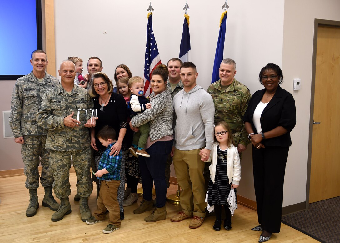 The Cochran family is awarded the 2016 Air National Guard Volunteer Family of the Year during the Family Readiness Awards ceremony April 1, 2017 at Camp Dodge, Iowa. The Family Readiness Awards is held annually to honor families that serve by giving freely of their time and talents, providing services, resources, or by sharing their skills to benefit service members and their families. (U.S. Air National Guard photo by Staff Sgt. Michael J. Kelly)