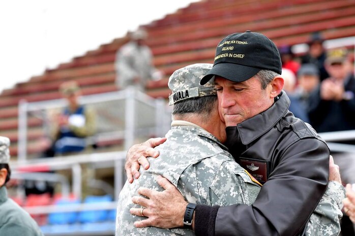 Gen. Frank Vavala receives a congratulatory from Governor John Carney during the Governors' Review of the Troops at Delaware State University, Dover, DE on April 1, 2017 (U.S. Air National Guard photo by Staff Sgt. John Michaels) 