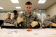 Members from the 927th Aeromedical Staging Squadron utilize pigs feet to practice on during the March UTA at MacDill Air Force Base, FL. (U.S. Air Force photo by Staff Sgt. Xavier Lockley)