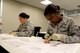 Members from the 927th Aeromedical Staging Squadron utilize pigs feet to practice on during the March UTA at MacDill Air Force Base, FL. (U.S. Air Force photo by Staff Sgt. Xavier Lockley)