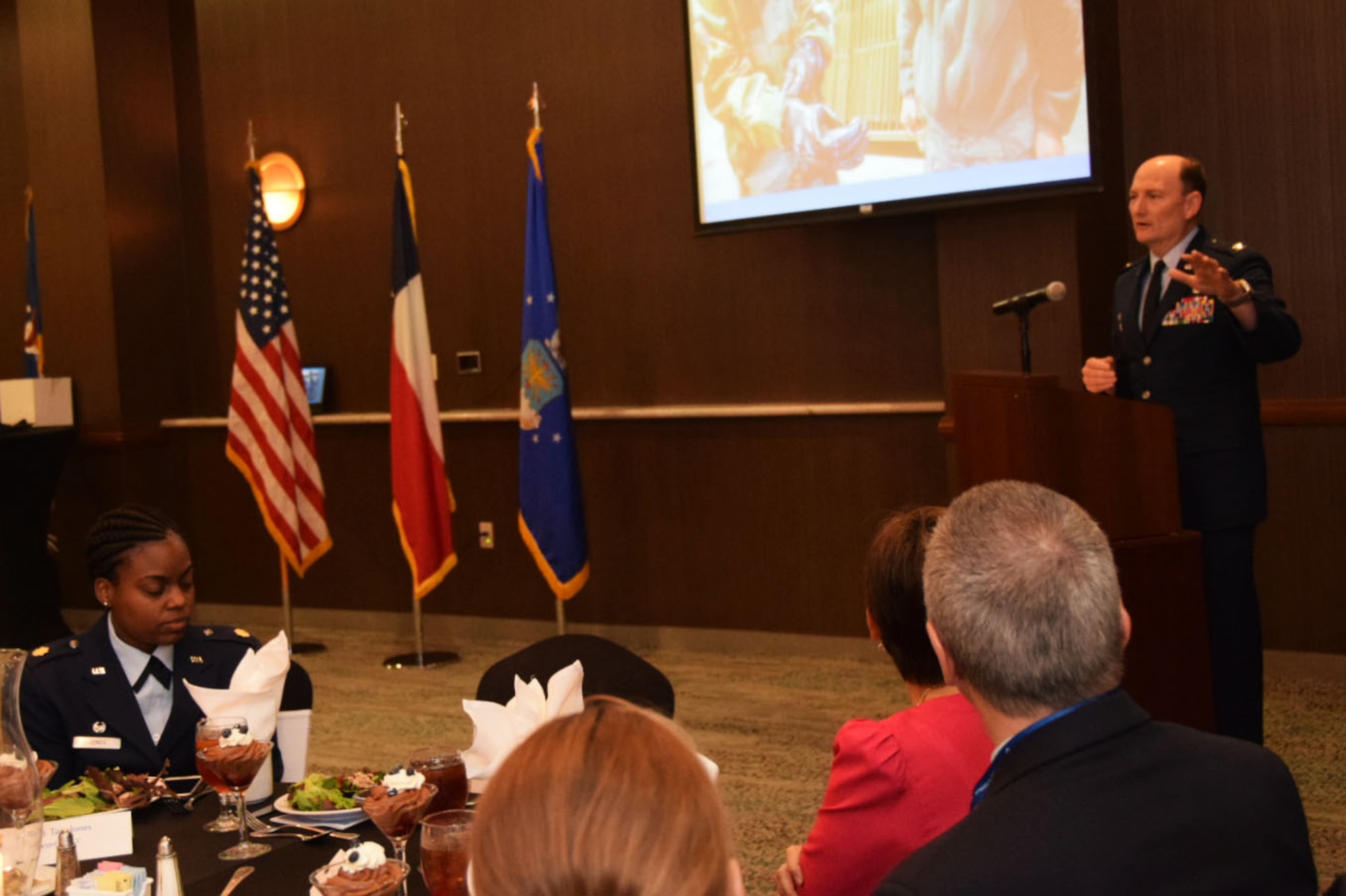 Col. Thomas K. Smith, Jr. , 433rd Airlift Wing commander,  welcomes 16 local civic leaders prior to the 433rd Airlift Wing's Honorary Commanders Program induction ceremony April1, 2017. The executive-level program is in its sixth year in the Alamo Wing and strengthens ties between the military and the local business community.  (U.S. Air Force photo by Tech. Sgt. Carlos J. Treviño)