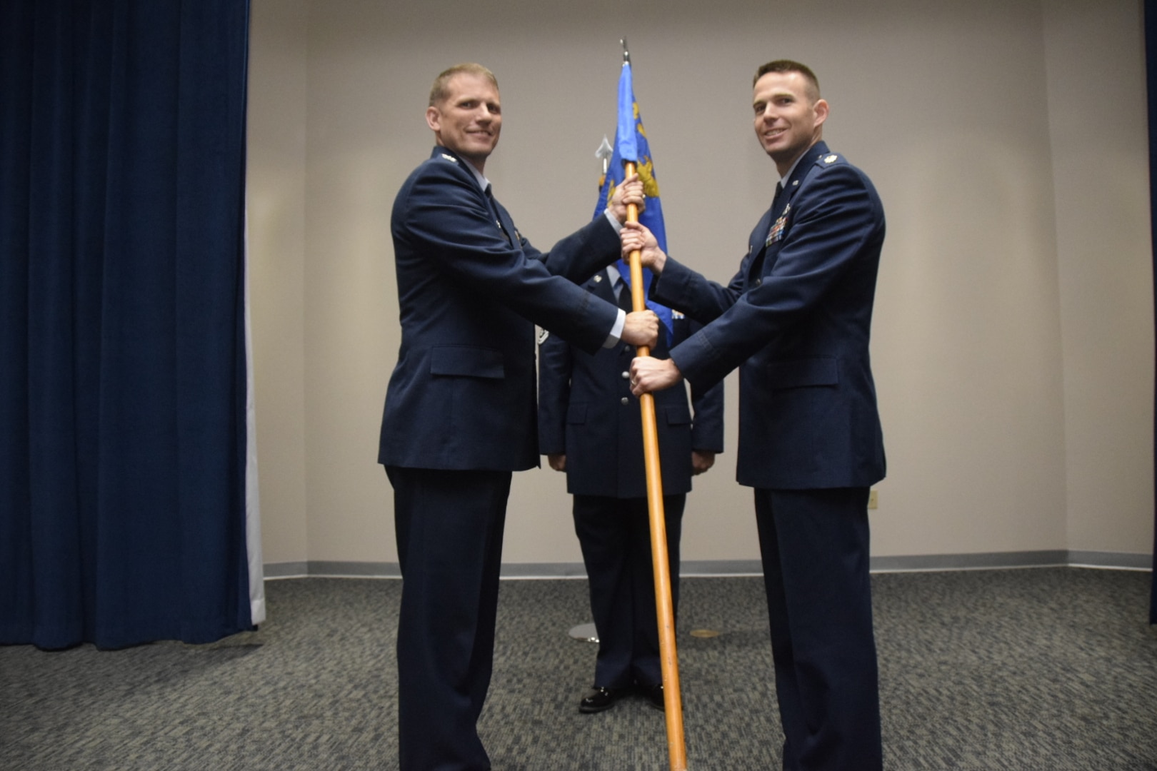 Col. David W. Enfield Jr., left, 433rd Mission Support Group commander, presents the 433rd Civil Engineer Squadron guidon to Maj. Nathan Leuthold, the squadron's new commander, during the unit change of command ceremony April 2, 2017 at Joint Base San Antonio-Lackland, Texas.
(U.S. Air Force photo by Tech. Sgt. Carlos J. Trevino)