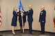 Col. Robert I. Kinney passes the 188th Intelligence, Surveillance and Reconnaissance Group guidon to Col. Bobbi J. Doreenbos, 188th wing commander, during the change of command ceremony March 1, 2017 at Ebbing Air National Guard Base, Fort Smith, Ark.  Kinney’s successor, Col. Stanley L. Stefancic III has served 24 years in the intelligence career field and has an extensive background in intelligence support to unit-level operations.    (U.S. Air National Guard photo by Senior Airman Matthew Matlock) 