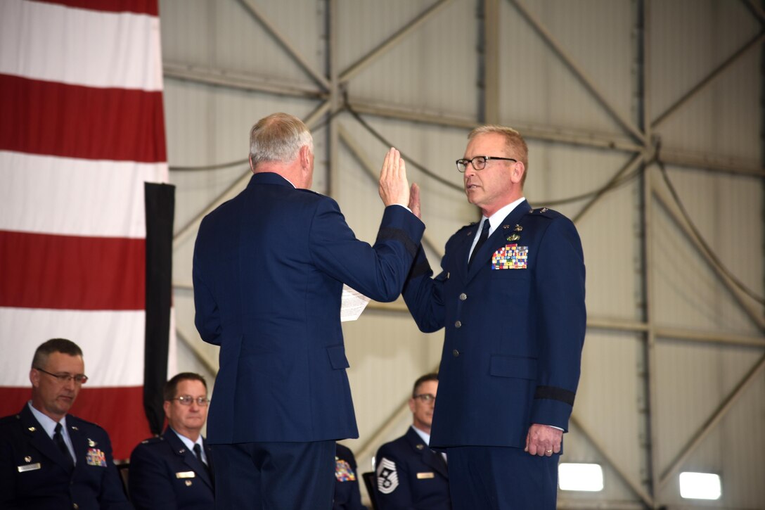 SIOUX FALLS, S.D. - Brig. Gen. Steven Warren, Assistant Adjutant General for Air, HQ SDANG, administered the oath of office to Brig. Gen. Joel DeGroot, during a transfer of authority ceremony at Joe Foss Field April 1st.  DeGroot previously served as the 114TH Maintenance group commander.  (U.S. Air National Guard photo by Staff Sgt. Duane Duimstra/Released)