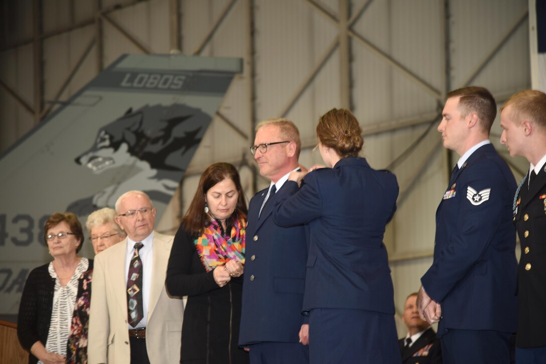 SIOUX FALLS, S.D. - Brig. Gen. Joel DeGroot, newly appointed Assistant Adjutant General for Air, was joined by his family members for his official pinning to Brigadier General at a ceremony held April 1.  DeGroot, former 114th Maintenance Group commander was also recognized for his transfer of authority to his new position as the Assistant Adjutant General for Air, South Dakota National Guard at this event.  (U.S. Air National Guard photo by Staff Sgt. Duane Duimstra/Released)