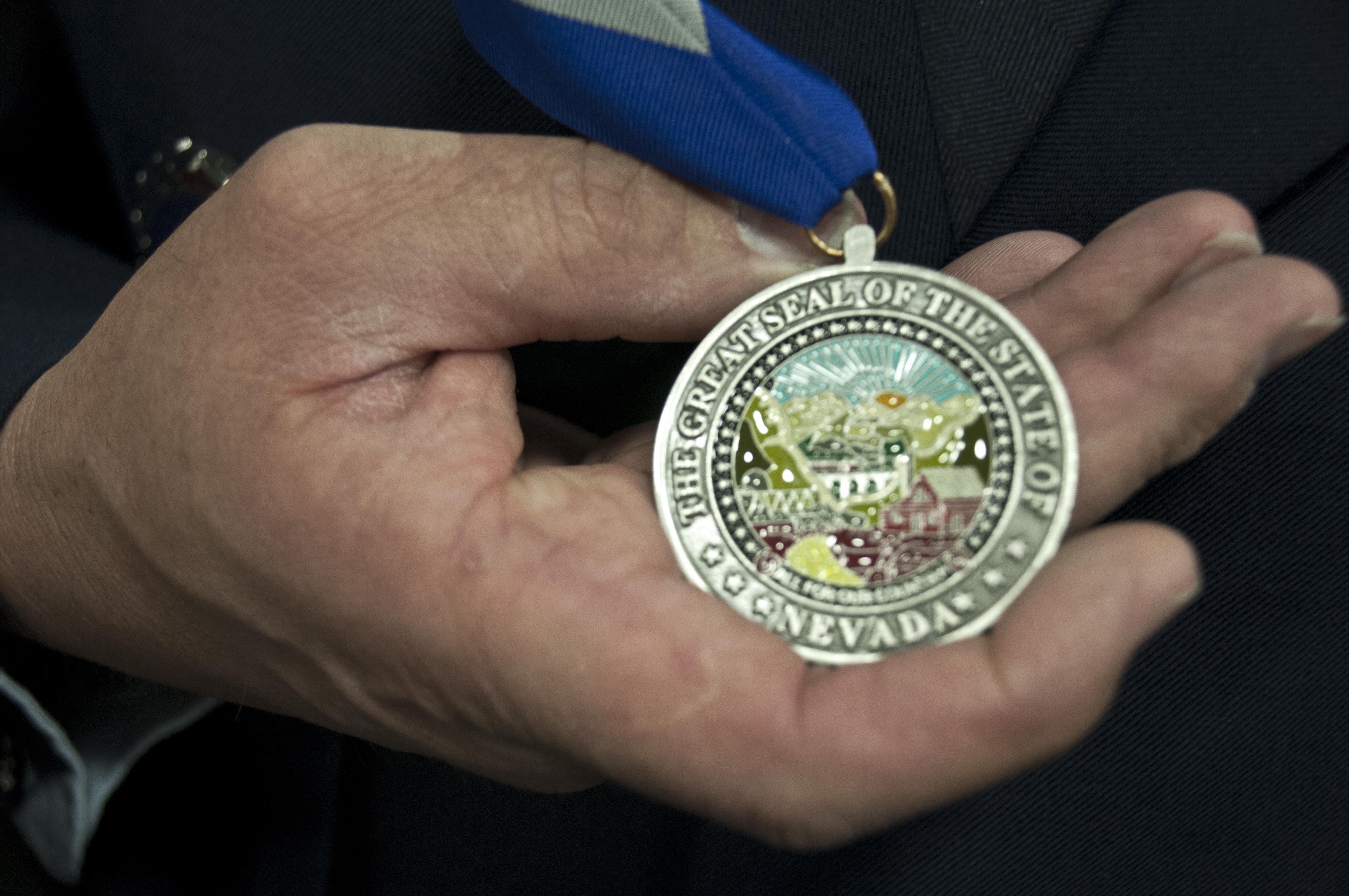 Master Sgt. Paul Hinen shows off his Drennan A. Clark-Order of Nevada medal April 2, 2017 at Nevada Air National Guard Base, Reno, Nev.