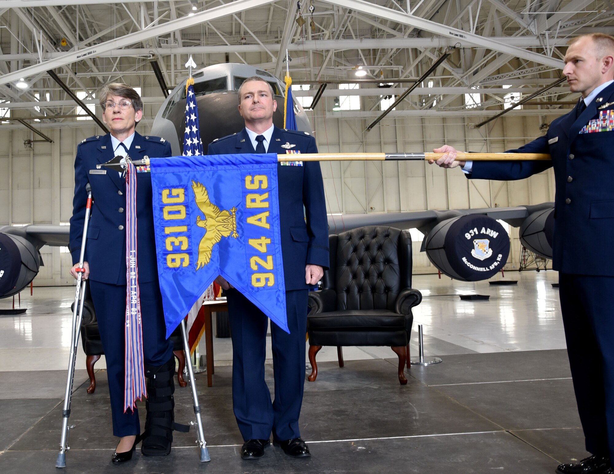 (Left to right) Col. Caroline Evernham, 931st Operations Group commander, Lt. Col. Terry McGee, incoming 924th Air Refueling Squadron commander, and Senior Master Sgt. Jay Guldjord, 18th Air Refueling Squadron boom operator, unfurl the flag signifying the standup of the 924th Air Refueling Squadron April 2, 2017, McConnell Air Force Base, Kan.  The 924th Air Refueling Squadron was last assigned to the 93rd Operations Group at Castle Air Force Base, Calif.  The unit was inactivated April 30, 1992. The 924 ARS at McConnell is the first unit in the Air Force dedicated solely to the KC-46A Pegasus.  The KC-46 is scheduled to arrive later this year.  (U.S. Air Force photo by Tech. Sgt. Abigail Klein)
