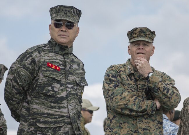 Commandant of the Marine Corps Gen. Robert B. Neller, right, and Republic of Korea (ROK) Marine Corps Lt. Gen. Sang-Hoon Lee, commandant of the ROK Marine Corps, observe an amphibious demonstration at the Pacific Amphibious Leaders Symposium (PALS) 2017, Pohang, South Korea, April 2, 2017. PALS is held annually to help strengthen relationships between allied Marine and Naval forces. (U.S. Marine Corps photo by Cpl. Samantha K. Braun)