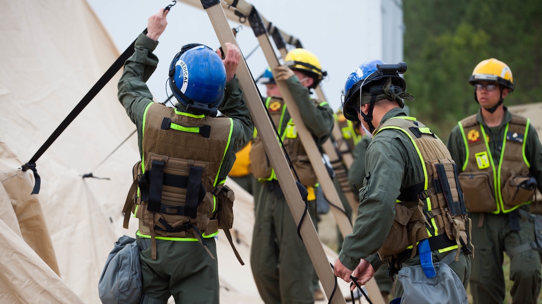 Marines and sailors with Chemical Biological Incident Response Force set up medical facilities at Guardian Centers in Perry, Georgia, March 23, 2017 during Exercise Scarlet Response 2017.  During a 36-hour field operation, the Marines with CBIRF had to safely extract victims from a collapsed building in the aftermath of a simulated disaster. The field operation is the final event of the exercise.