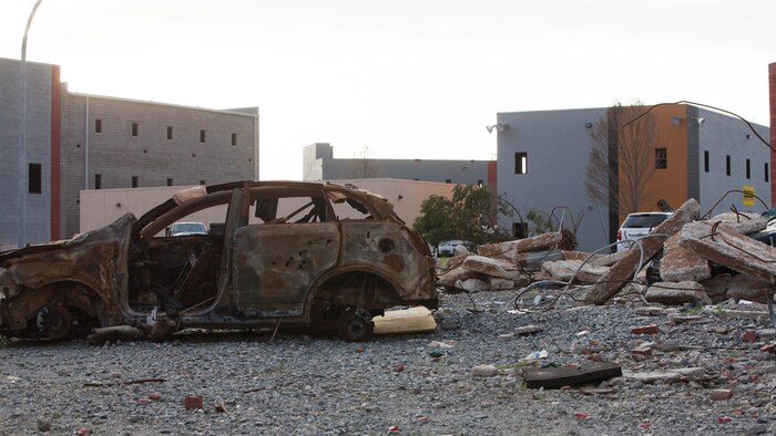 Destroyed cars and debris cover a simulated city at Guardian Centers in Perry, Georgia, March 24, 2017, during Exercise Scarlet Response 2017.  The city is the setting of a scenario in which an earthquake has destroyed most of the structures within, causing many people to become victims of the disaster. The Marines with Chemical Biological Incident Response Force responded to the disaster as part of their 36-hour final assessment for Scarlet Response.