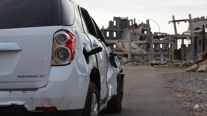 Destroyed cars and debris cover a simulated city at Guardian Centers in Perry, Georgia, March 24, 2017, during Exercise Scarlet Response 2017.  The city is the setting of a scenario in which an earthquake has destroyed most of the structures within, causing many people to become victims of the disaster. The Marines with Chemical Biological Incident Response Force responded to the disaster as part of their 36-hour final assessment for Scarlet Response.
